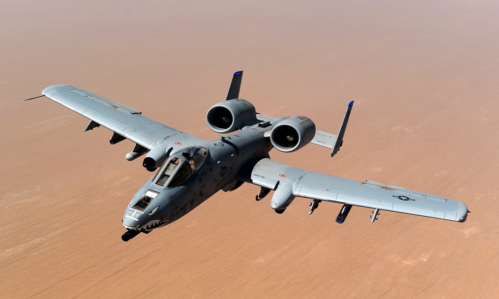 An A-10 Thunderbolt II, assigned to the 74th Fighter Squadron, Moody Air Force Base, GA, returns to mission after receiving fuel from a KC-135 Stratotanker, 340th Expeditionary Air Refueling Squadron, over the skies of Afghanistan in support of Operation Enduring Freedom, May 8, 2011. (U.S. Air Force photo/Master Sgt. William Greer)